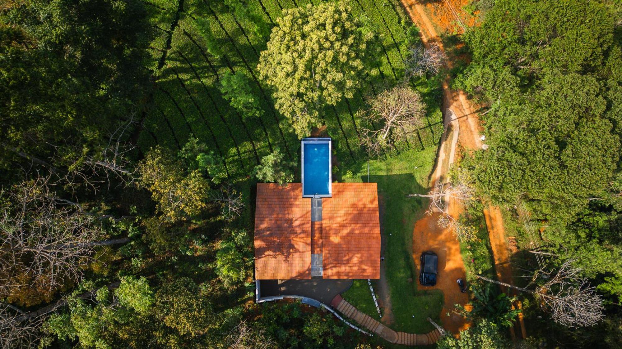 Tealawn Pool Villa, Munnar Buitenkant foto